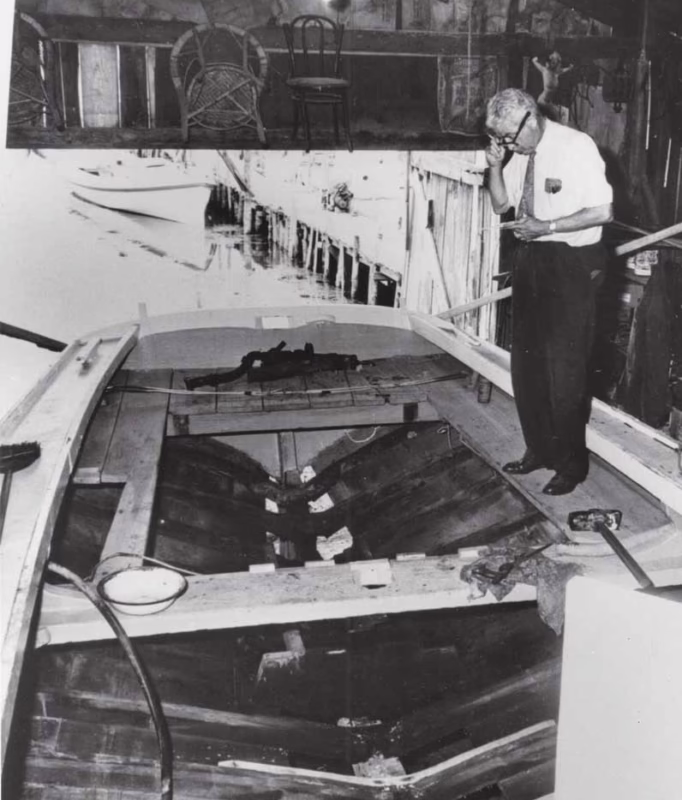 Howard Chapelle examining a craft